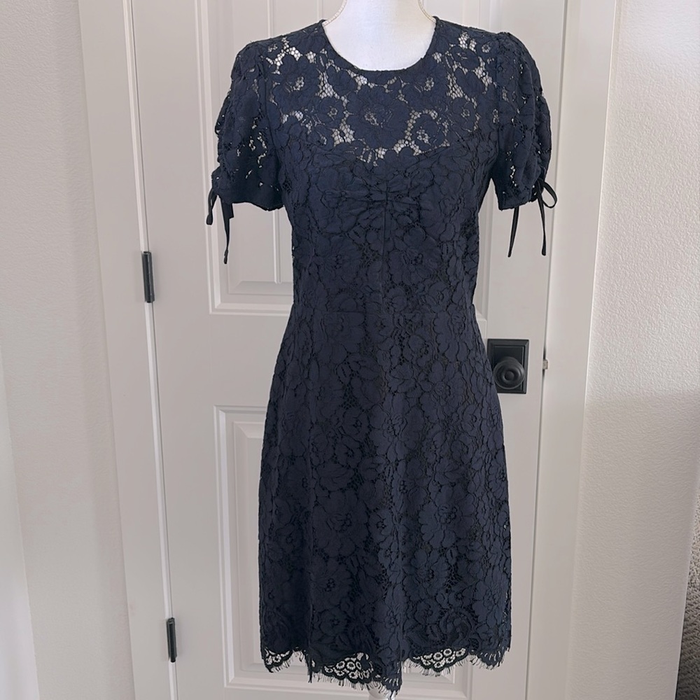 Gorgeous navy blue fully lined lace dress. 35” from shoulder to hem.